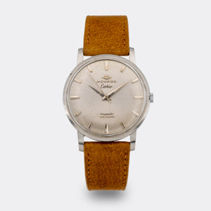 MOVADO | by CARTIER - double signed | Kingmatic | Fab. Suisse | Sword Hand | Cream Patined Dial | 1960s