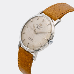 MOVADO | by CARTIER - double signed | Kingmatic | Fab. Suisse | Sword Hand | Cream Patined Dial | 1960s